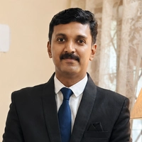Dr. Abin George